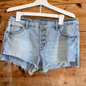Free People distressed denim cut-off shorts button fly